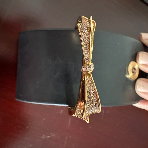 Kate spade gold tone bracelet with stone bow clasp is on the side - Picture 2 of 2
